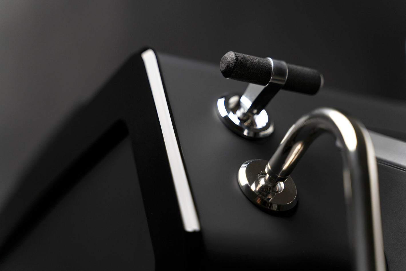 Close-up of the ergonomic star/stop lever to activate water and steam with just one click on the Sanremo YOU espresso machine, ideal for passionate home brewers and small café owners